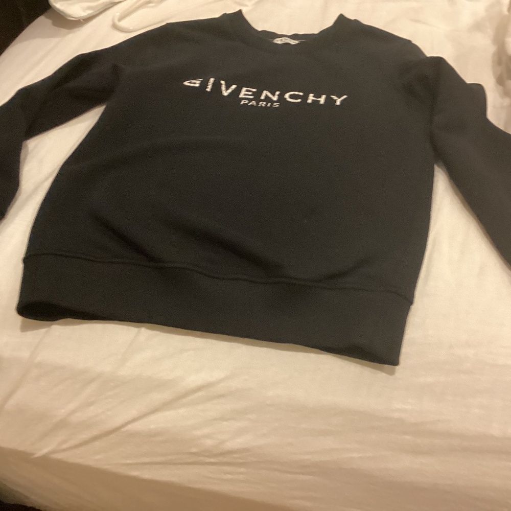 I am selling a Givenchy Paris sweater.
